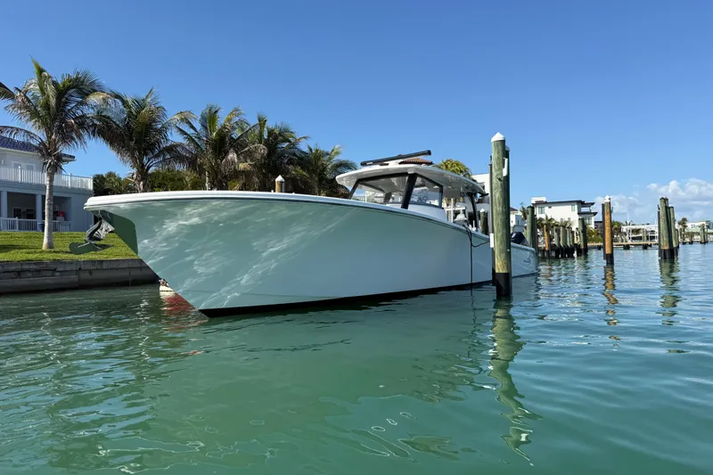 Slide: The Image of 2020 Streamline 45 boat docked in sunny marina with palm trees. - 5