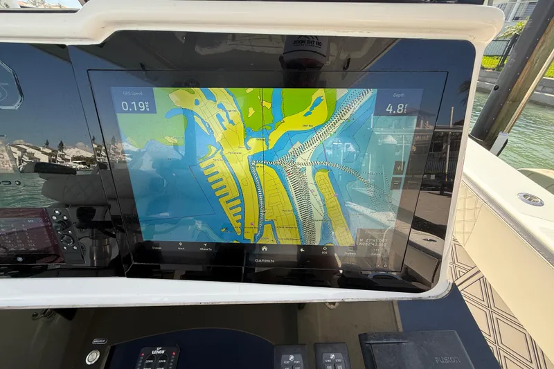 Slide: The Image of Boat navigation system displaying a colorful map on a Streamline 45, 2020 model. - 54