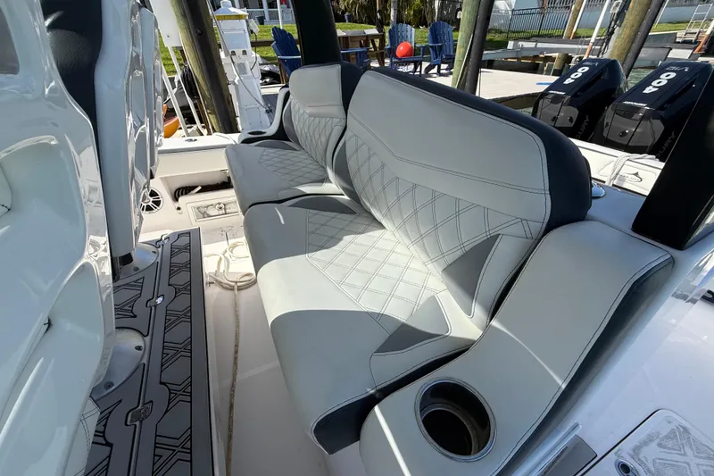 Slide: The Image of Luxurious seating on 2020 Streamline 45 boat with stylish upholstery and cup holder. - 65