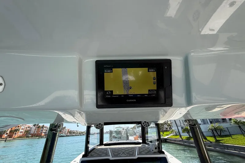 Slide: The Image of Boat interior with Garmin GPS display, Streamline 45 model, 2020, navigating a canal. - 68