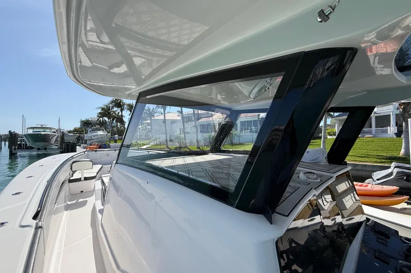 Slide: The Image of Streamline 45 boat, 2020 model, docked with sleek design and modern features. - 76