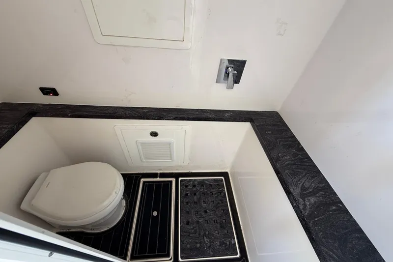 Slide: The Image of Compact bathroom with modern fixtures in a 2020 Streamline 45 model. - 96