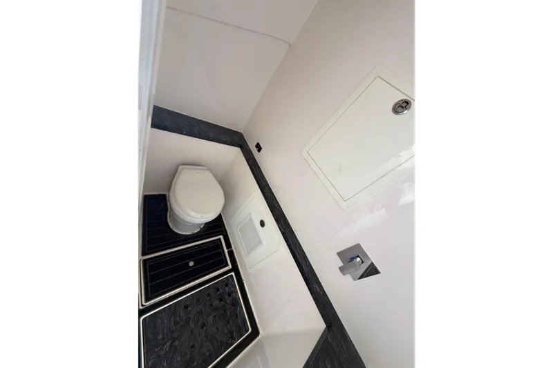 Slide: The Image of Compact bathroom interior in 2020 Streamline 45 model, featuring modern fixtures and sleek design. - 99