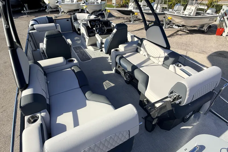 Slide: The Image of 2026 Avalon 2385 Catalina Quad Lounger, Tri Toon, high-performance boat interior with luxurious seating. - 11