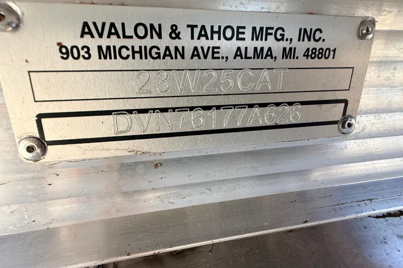 Slide: The Image of Metal identification plate for 2026 Avalon 2385 Catalina Quad Lounger, featuring model and serial numbers. - 25