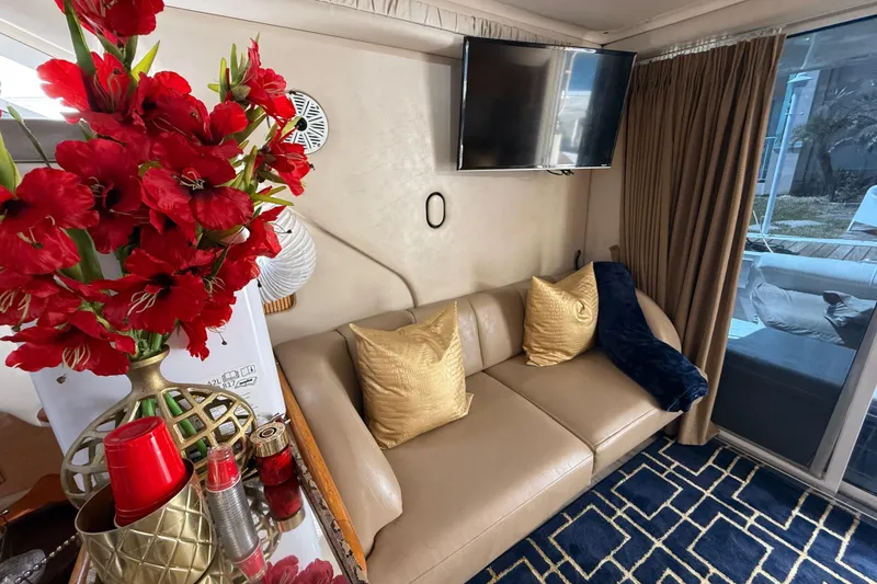 Slide: The Image of Luxurious interior of 1998 Sea Ray 400 Sedan Bridge with elegant decor and comfortable seating. - 30