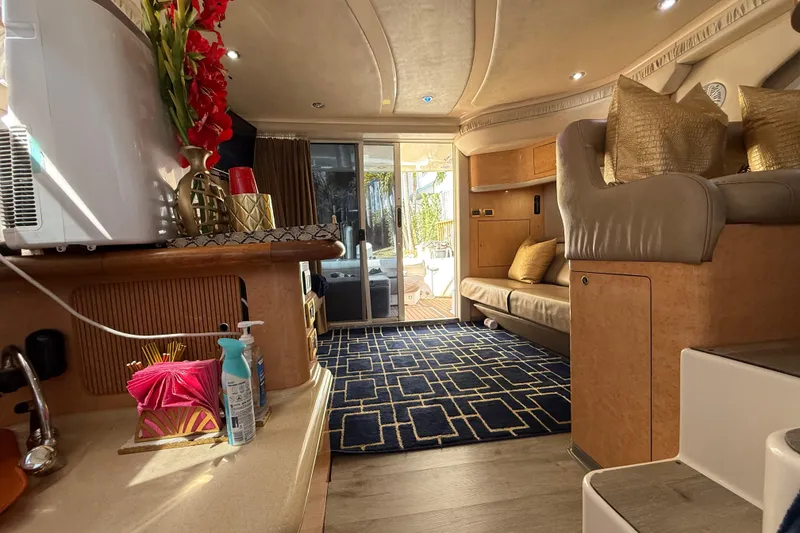 Slide: The Image of Luxurious interior of a 1998 Sea Ray 400 Sedan Bridge yacht with elegant decor. - 39
