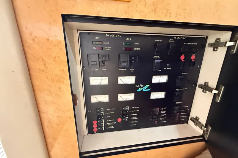 Slide: The Image of Electrical control panel on a 1998 Sea Ray 400 Sedan Bridge yacht. - 43