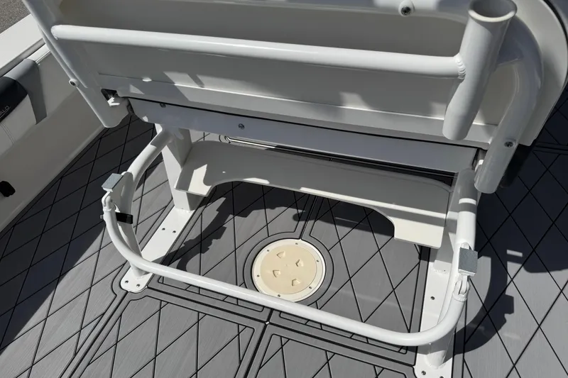 Slide: The Image of 2022 Robalo 266 Cayman boat deck with seating and storage features. - 108