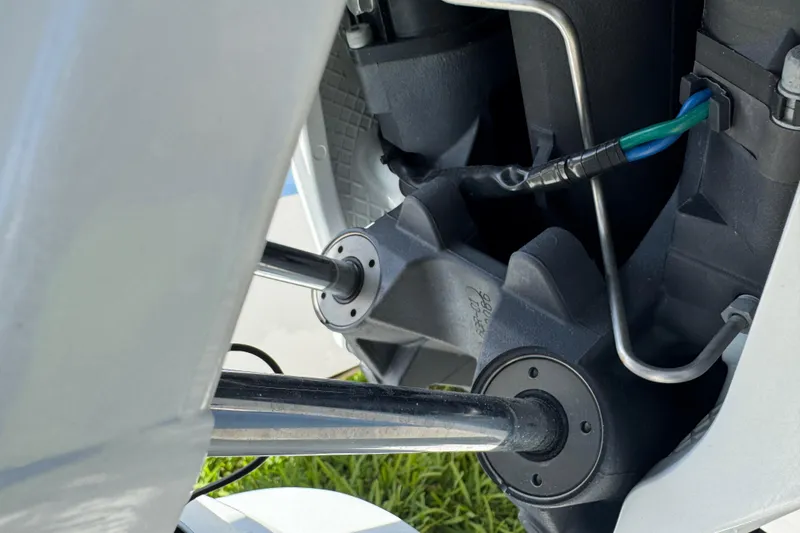 Slide: The Image of Close-up of 2022 Robalo 266 Cayman boat engine components and wiring. - 32