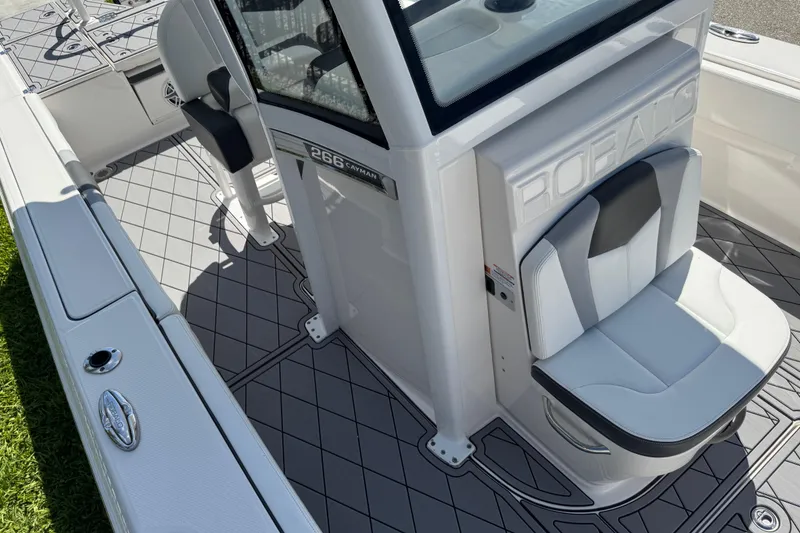 Slide: The Image of 2022 Robalo 266 Cayman boat interior with sleek seating and modern design. - 87