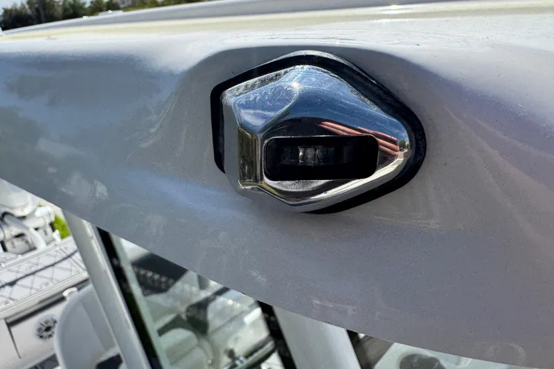 Slide: The Image of Chrome detail on 2022 Robalo 266 Cayman boat exterior. - 88