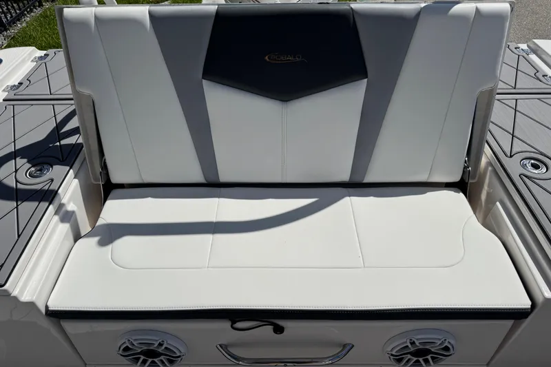 Slide: The Image of 2022 Robalo 266 Cayman boat seat with white and gray upholstery. - 96