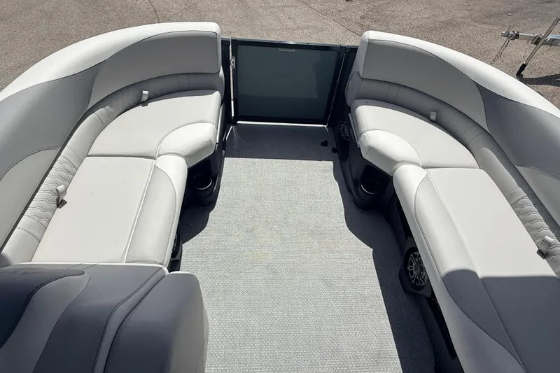 Slide: The Image of 2026 Avalon 2385 LSZ Rear Fish Tri Toon interior with spacious seating and modern design. - 14