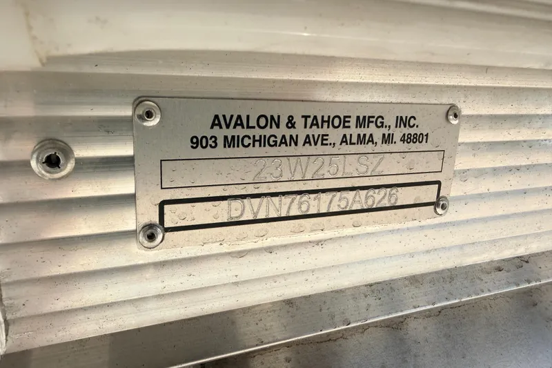 Slide: The Image of Metal identification plate on Avalon 2385 LSZ Rear Fish, Tri Toon, High Performance, 2026 model. - 25