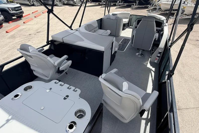 Slide: The Image of 2026 Avalon 2385 LSZ Rear Fish Tri Toon boat interior with seating and fishing setup. - 8