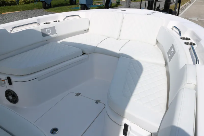 Slide: The Image of 2026 Sea Fox 248 Commander boat with luxurious white seating and cup holders. - 6
