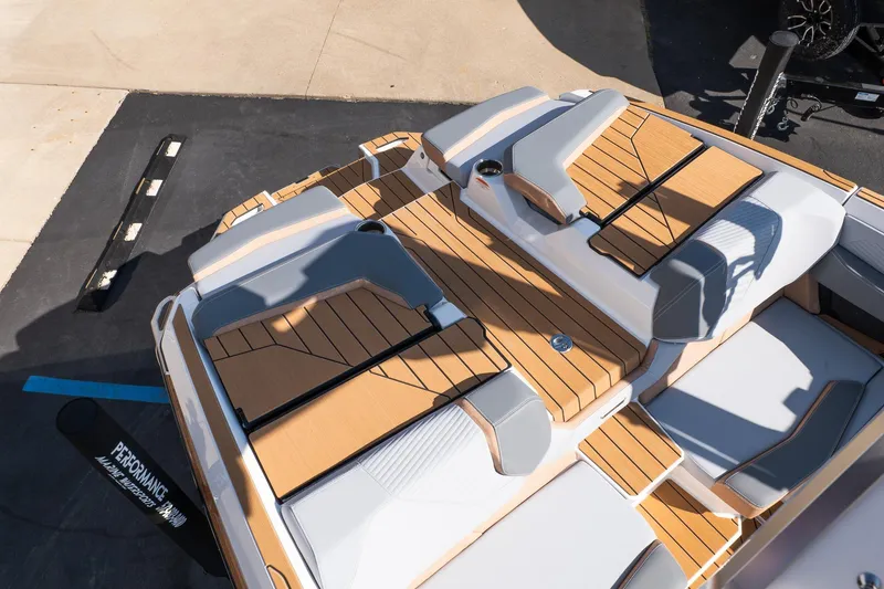 Slide: The Image of 2026 MasterCraft X24 boat with sleek, modern seating and teak decking. - 20
