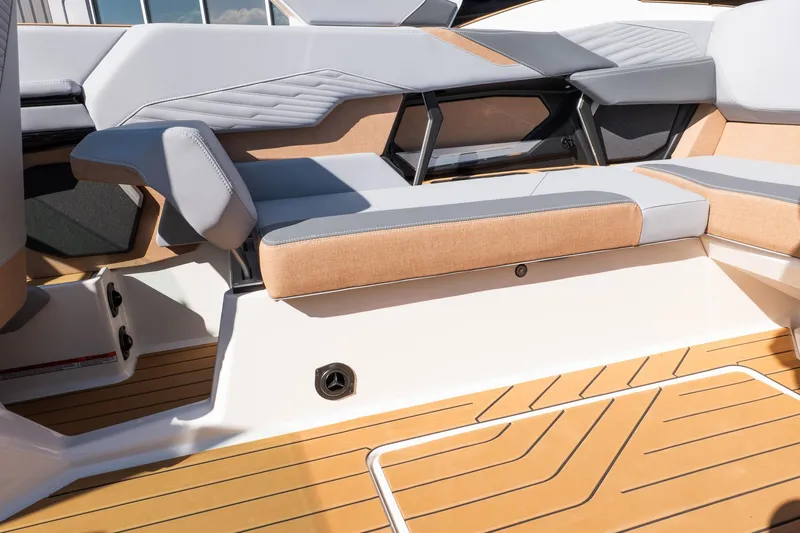 Slide: The Image of 2026 MasterCraft X24 boat interior with stylish seating and teak flooring. - 41