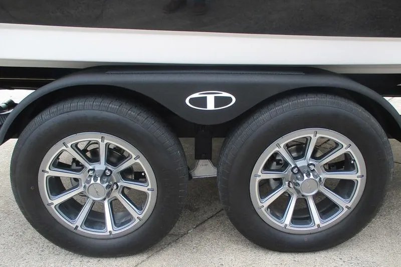 Slide: The Image of 2026 Tahoe 2150 trailer wheels with stylish alloy rims on concrete surface. - 11