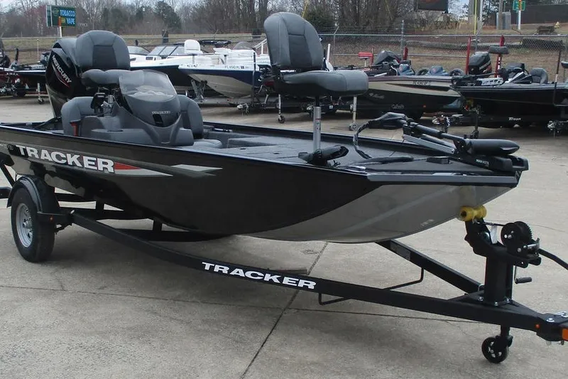 Slide: The Image of 2026 Tracker Pro 170 fishing boat on trailer in outdoor showroom. - 3
