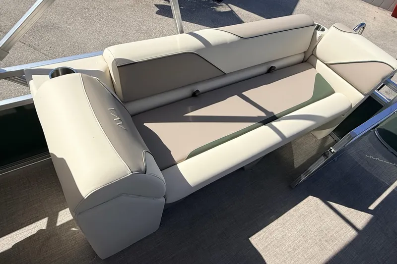Slide: The Image of 2026 Avalon 2385 Venture 85 Quad Lounger boat seating, beige upholstery, outdoor setting. - 22