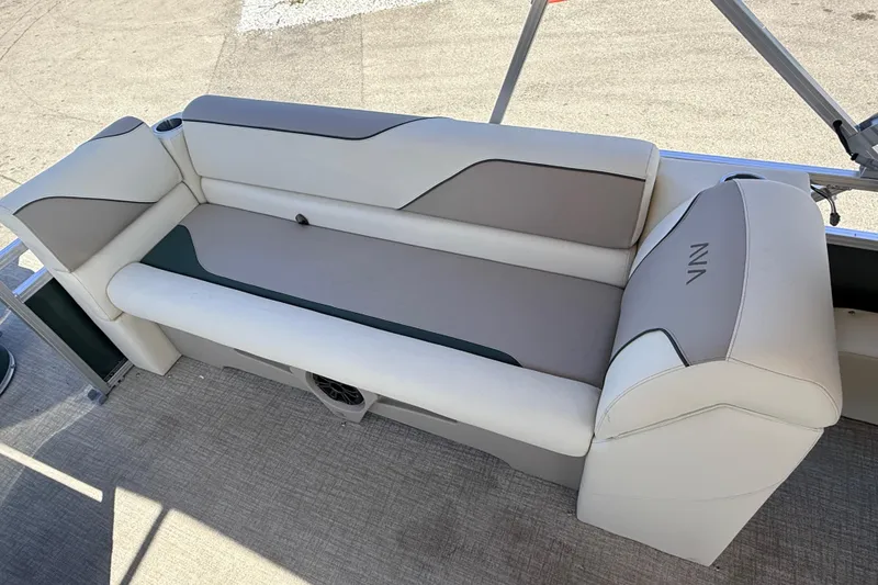 Slide: The Image of 2026 Avalon 2385 Venture 85 Quad Lounger boat seating, featuring comfortable beige upholstery. - 23