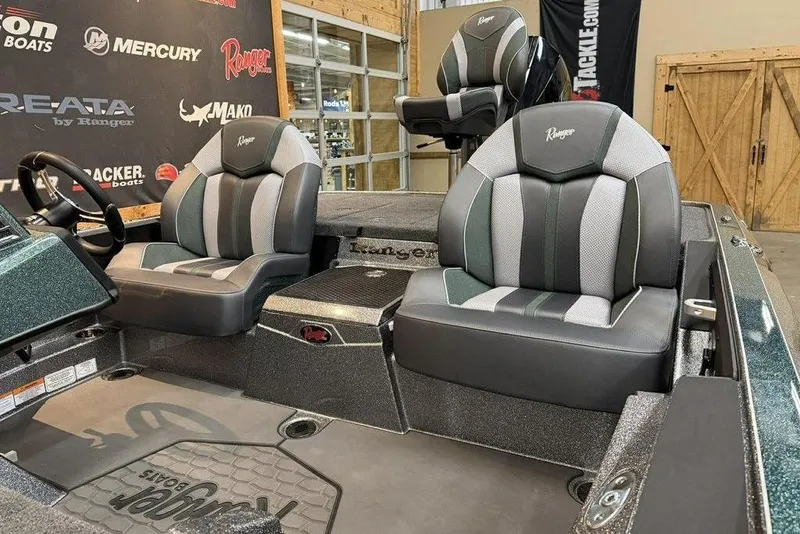 Slide: The Image of 2026 Ranger Z519R Cup-Equipped boat interior with premium seating and steering wheel. - 14