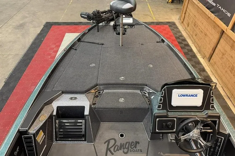 Slide: The Image of 2026 Ranger Z519R Cup-Equipped boat interior with Lowrance electronics and steering wheel. - 5