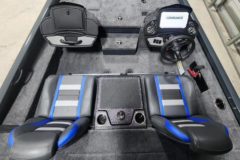 Slide: The Image of 2026 Ranger RT198P boat interior with dual seats, steering console, and Lowrance display. - 4