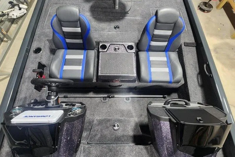 Slide: The Image of 2026 Ranger RT198P boat interior with dual seats and modern dashboard. - 7