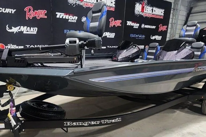 Slide: The Image of 2026 Ranger RT198P fishing boat on display with trailer and seating. - 9