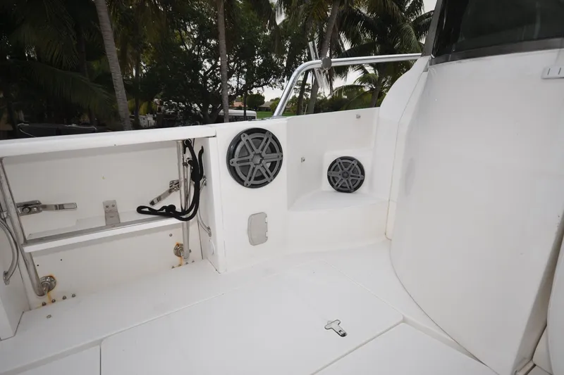 Slide: The Image of 2009 Intrepid 430 Sport Yacht deck with speakers and storage compartment. - 25