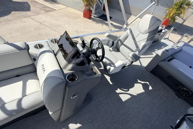 Slide: The Image of 2026 Avalon 2385 Venture 85 VRB Tri Toon boat interior with modern helm and seating. - 17