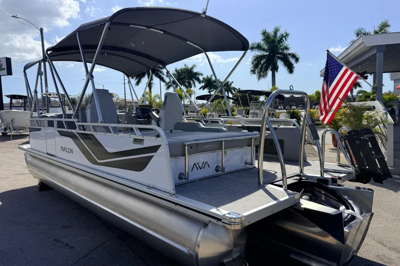 Slide: The Image of 2026 Avalon 2385 Venture 85 VRB Tri Toon boat with canopy and American flag. - 9