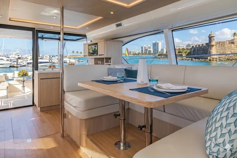 Slide: The Image of Luxurious interior of 2020 Aquila 44 Yacht with scenic marina view. - 7