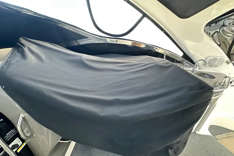 Slide: The Image of 2008 Regal Commodore 4060 boat interior with covered seating area. - 28