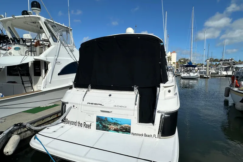 Slide: The Image of 2008 Regal Commodore 4060 yacht docked at marina, Hammock Beach, FL. - 3
