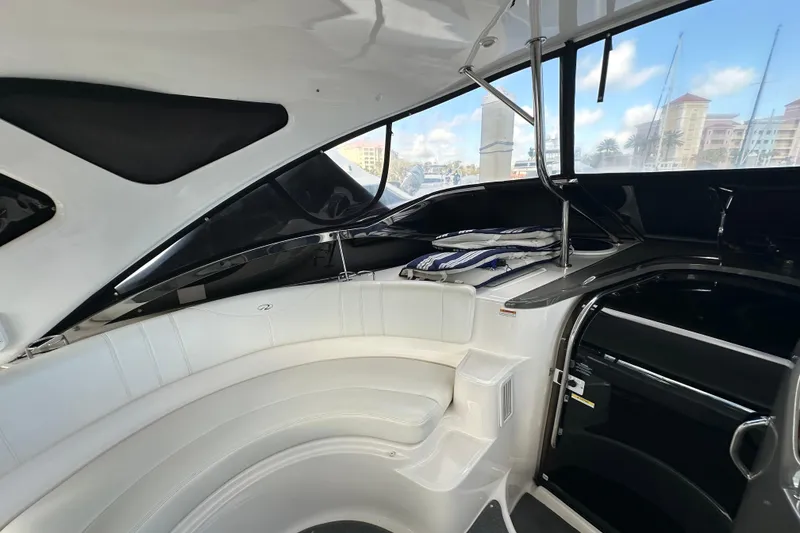 Slide: The Image of Interior of 2008 Regal Commodore 4060 yacht with white seating and modern design. - 40