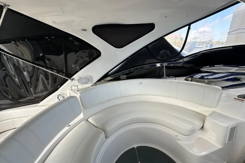 Slide: The Image of Luxurious interior of 2008 Regal Commodore 4060 yacht with white seating and sleek design. - 41