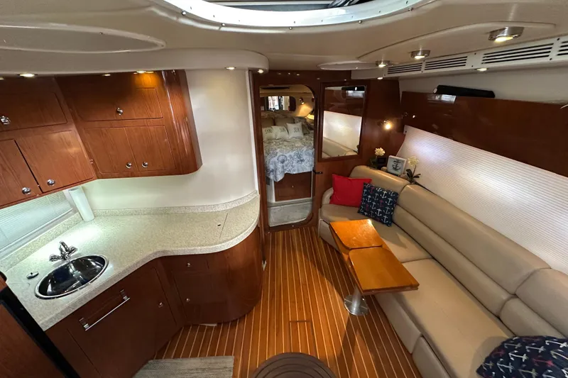 Slide: The Image of Luxurious interior of 2008 Regal Commodore 4060 yacht with elegant wood finishes. - 42