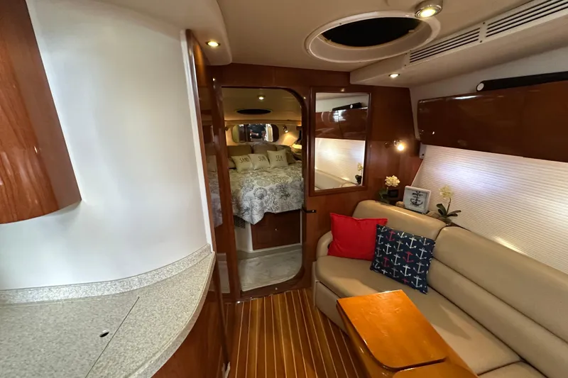 Slide: The Image of Luxurious interior of 2008 Regal Commodore 4060 yacht with cozy seating and elegant decor. - 46