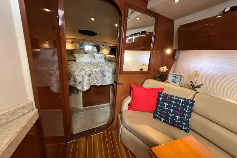 Slide: The Image of Luxurious interior of 2008 Regal Commodore 4060 yacht with cozy seating and elegant decor. - 47