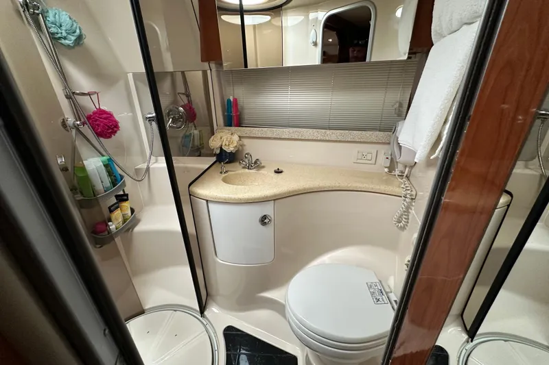 Slide: The Image of Luxurious bathroom in 2008 Regal Commodore 4060 yacht with modern amenities and elegant design. - 63