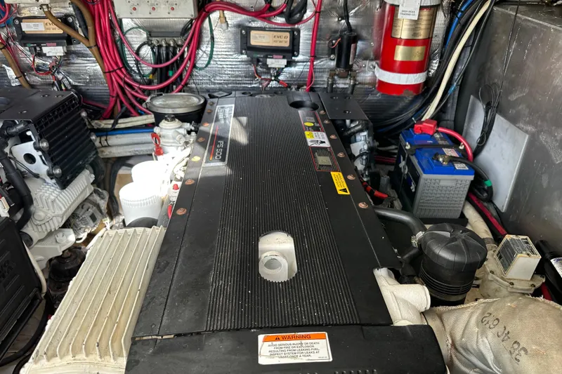 Slide: The Image of Engine room of 2008 Regal Commodore 4060 with wiring and components visible. - 67