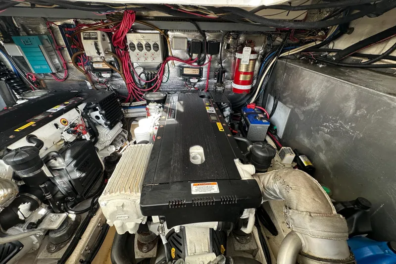 Slide: The Image of Engine room of 2008 Regal Commodore 4060 with wiring and components visible. - 68