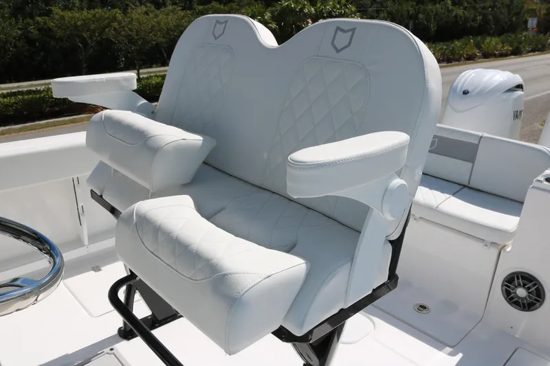 Slide: The Image of Luxurious seating on 2026 Sea Fox 268 Commander boat, featuring white cushioned armchairs. - 11