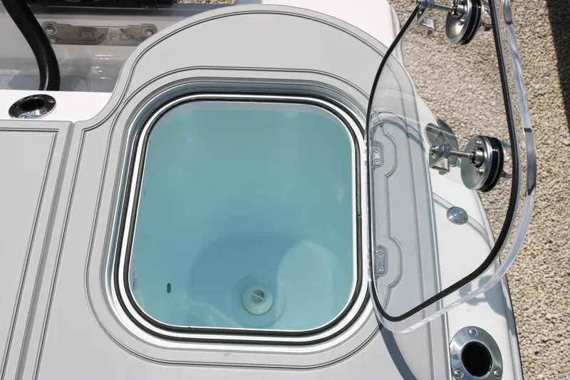 Slide: The Image of Livewell on 2026 Sea Fox 288 Commander boat, open lid, clear view inside. - 15