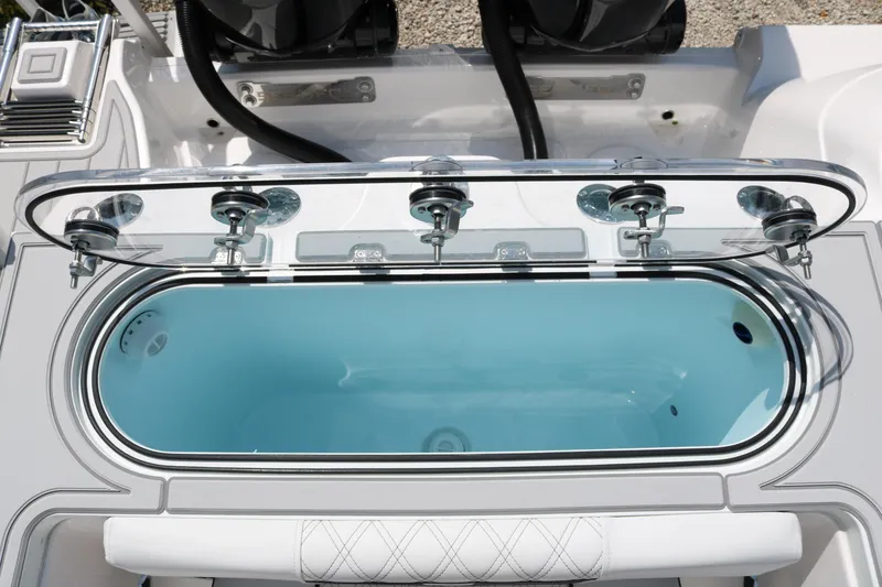 Slide: The Image of 2026 Sea Fox 288 Commander livewell with open lid, showcasing sleek design and functionality. - 16