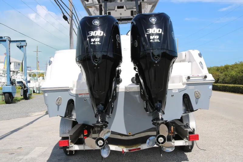 Slide: The Image of 2026 Sea Fox 288 Commander with dual Yamaha 300 V6 engines on a trailer. - 5